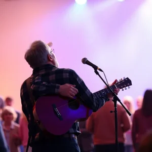 Cole Swindell performing during a tribute to Charlie Kirk